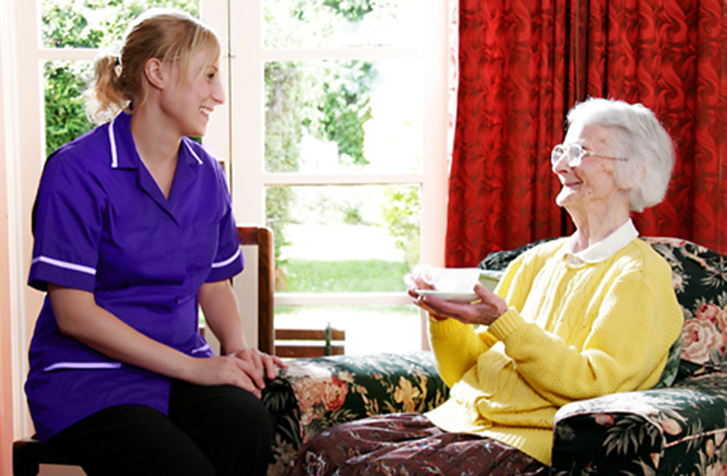 NR Care worker with service user